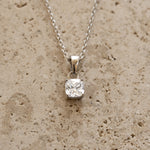 Sterling silver cushion diamond pendant necklace from Sami Jewels featuring a sparkling square-cut diamond centerpiece.