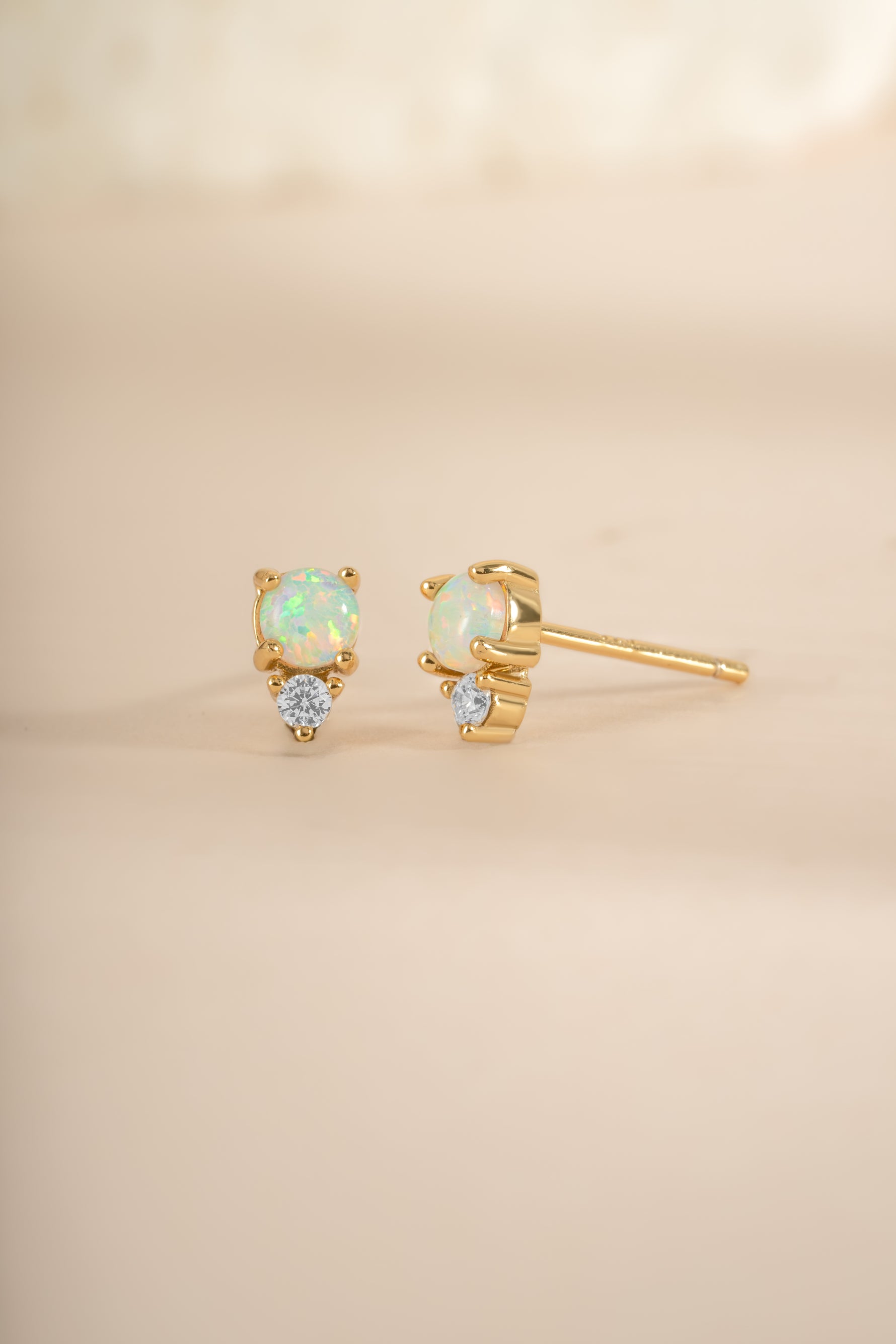 Gold Opal and CZ stud earrings by Sami Jewels featuring sparkling cubic zirconia and vibrant opal gemstones.