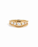 White background image of gold chevron ring set featuring 5 CZ stones.