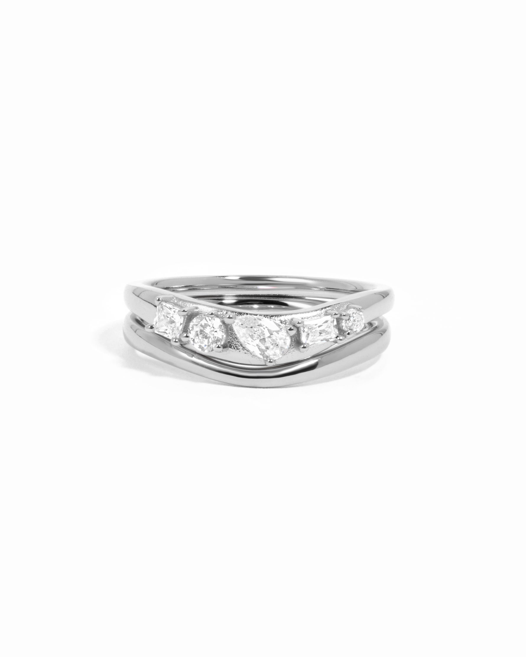 White background image of silver wavy statement ring set featuring 5 CZ stones.