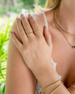 Gold CZ Dome Ring by Sami Jewels featuring a smooth, rounded design and sparkling cubic zirconia stones.