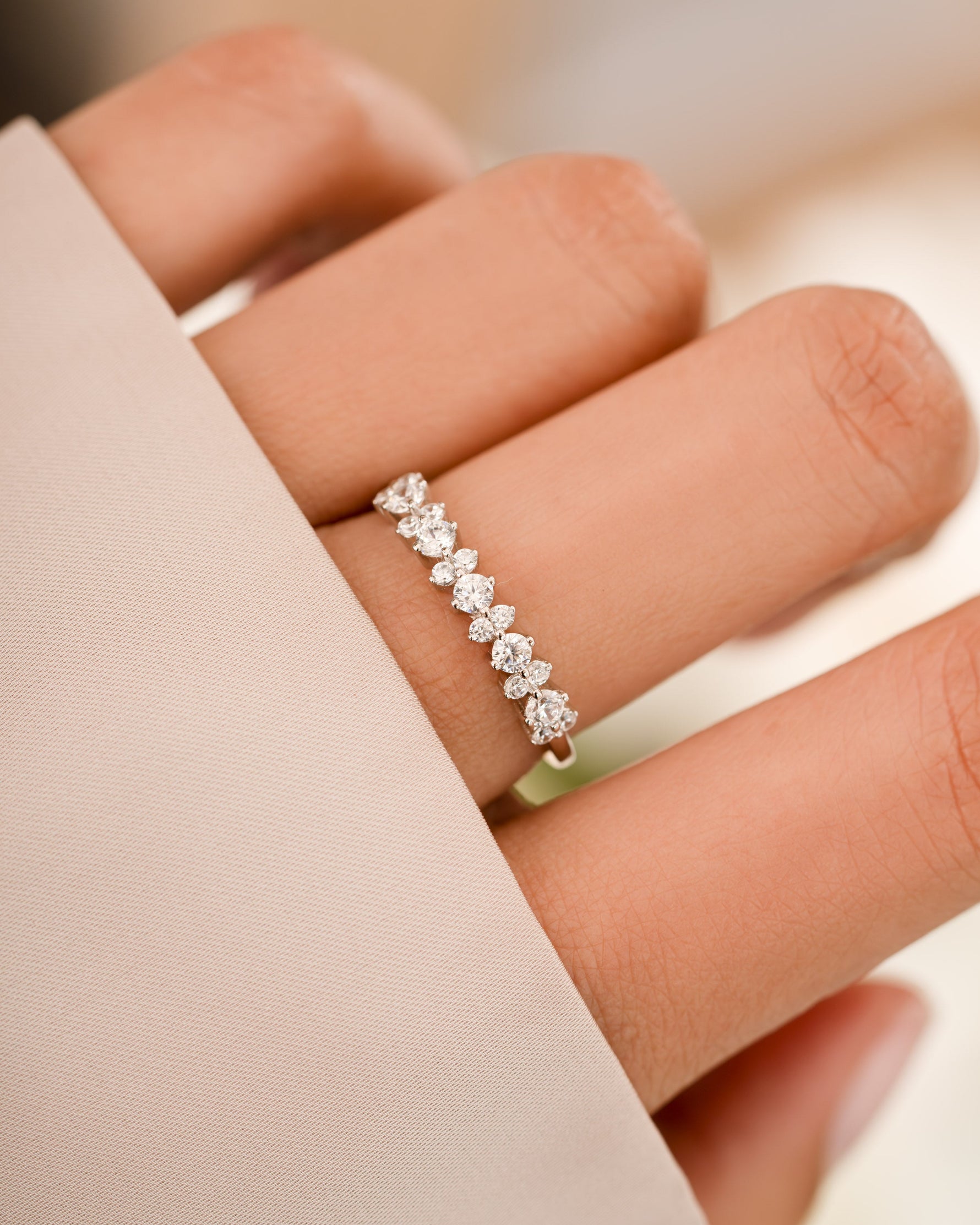 Sterling silver CZ Stephanie stacking ring by Sami Jewels worn on a model's finger, featuring sparkling cubic zirconia stones.