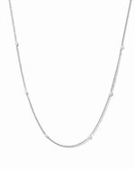 Dainty beaded pearl necklace by Sami Jewels featuring small white pearls on a sterling silver chain.
