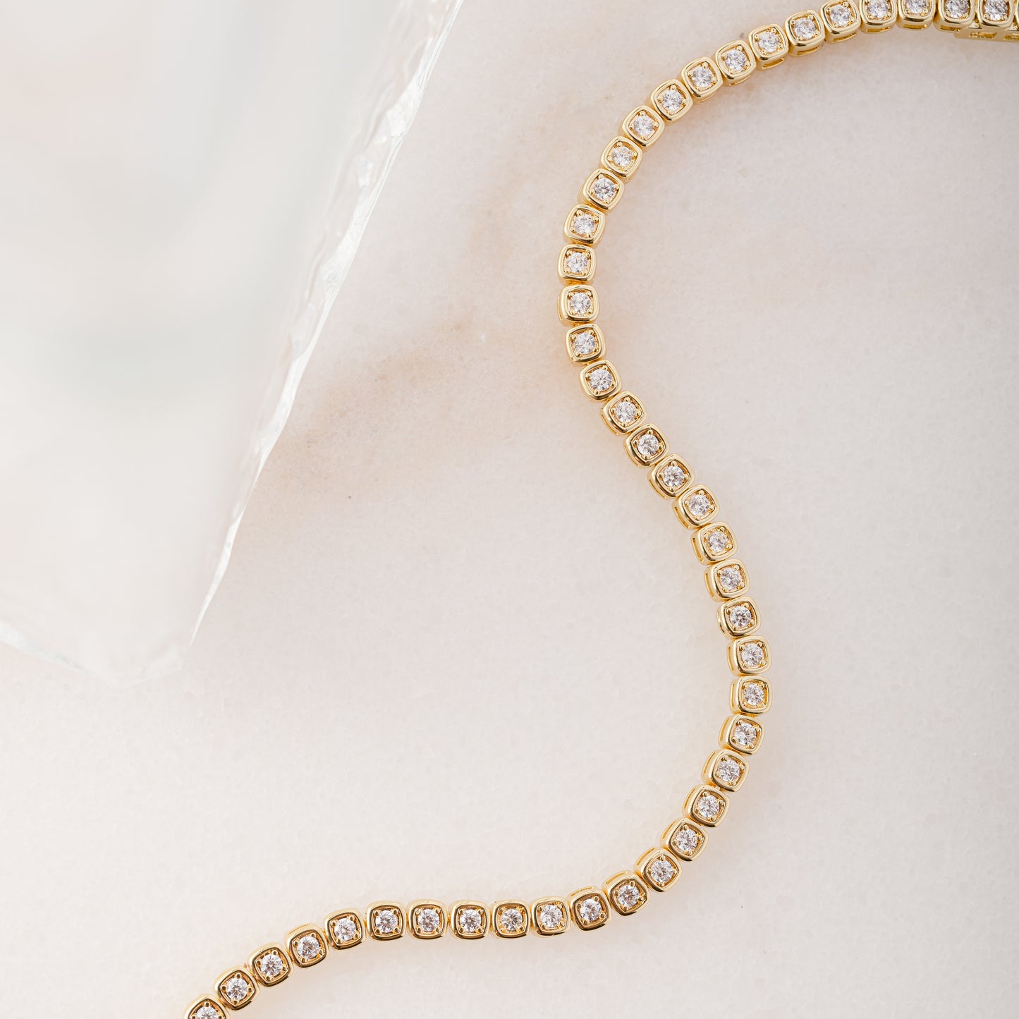 dainty gold tennis bracelet made with cubic zirconia