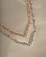 Dainty sterling silver and rose gold Chevron necklace from Sami Jewels, featuring a sleek, modern design.