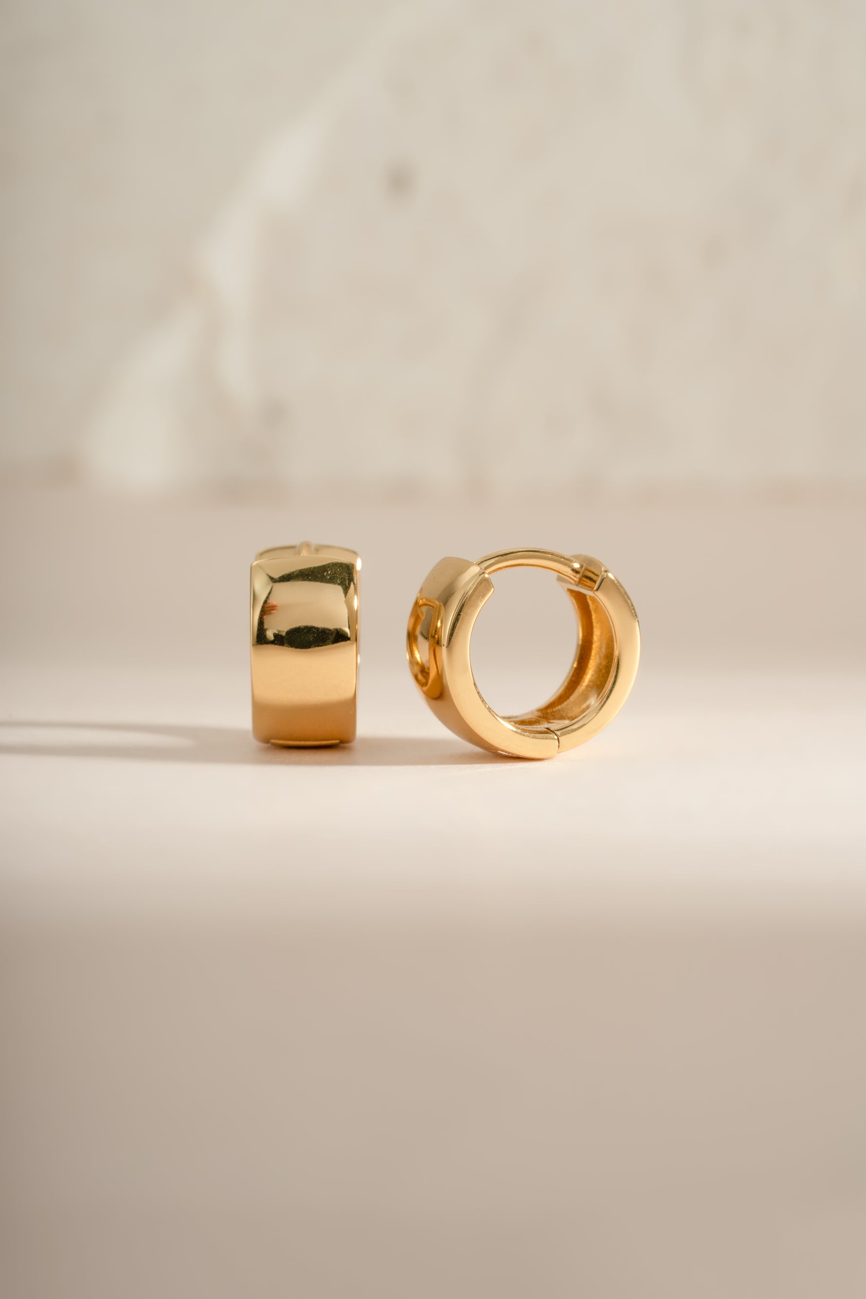Gold small chunky hoop earrings by Sami Jewels, featuring dainty and stylish hoop design for everyday wear.