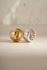 Dainty small chunky hoop earrings by Sami Jewels in sterling silver and gold, showcasing a stylish and modern jewelry design.