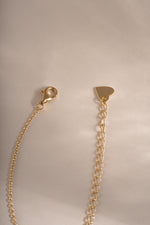 Gold dainty diamond bar necklace by Sami Jewels featuring a lobster clasp closure, elegant and minimalist jewelry for everyday wear.