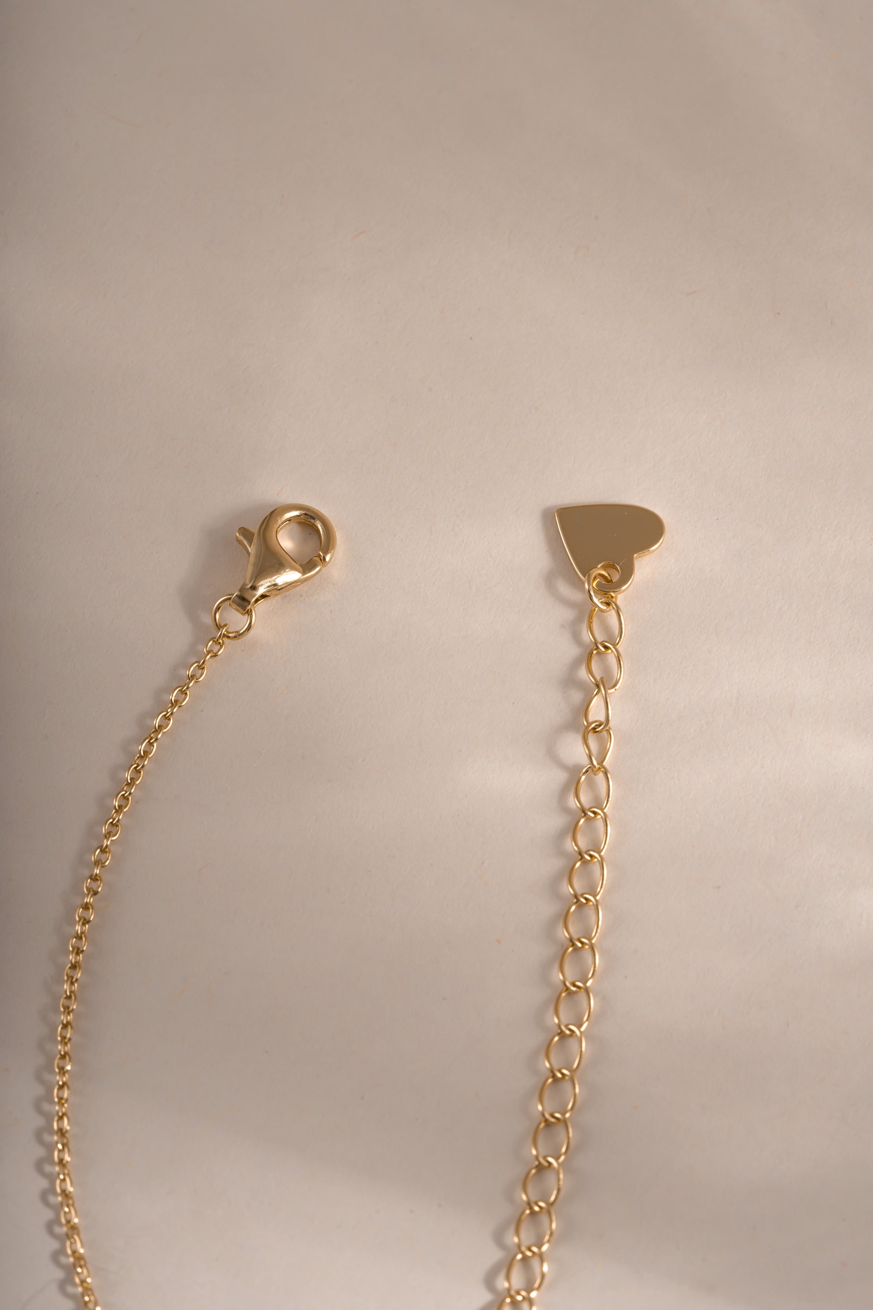 Gold dainty diamond bar necklace by Sami Jewels featuring a lobster clasp closure, elegant and minimalist jewelry for everyday wear.