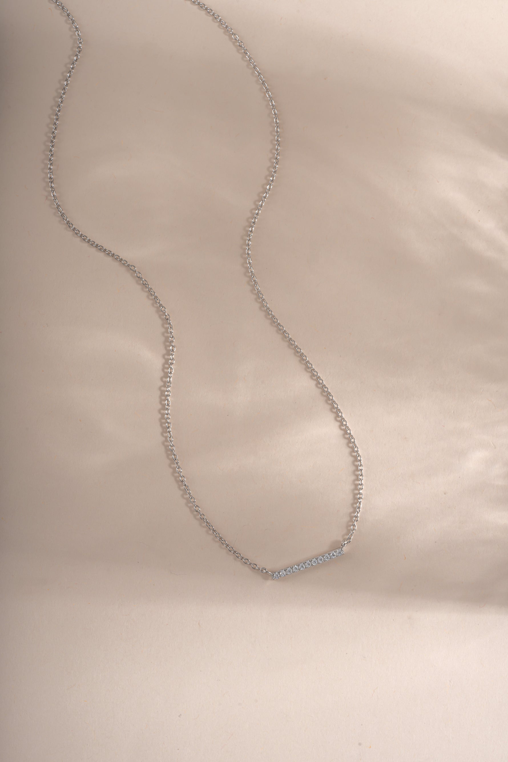 Sterling silver Dainty Bar Necklace by Sami Jewels featuring a slim, minimalist diamond bar pendant on a delicate chain.