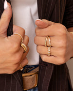 Dainty gold fluted ring from Sami Jewels styled on a model's finger, showcasing elegant, minimalist jewelry design.