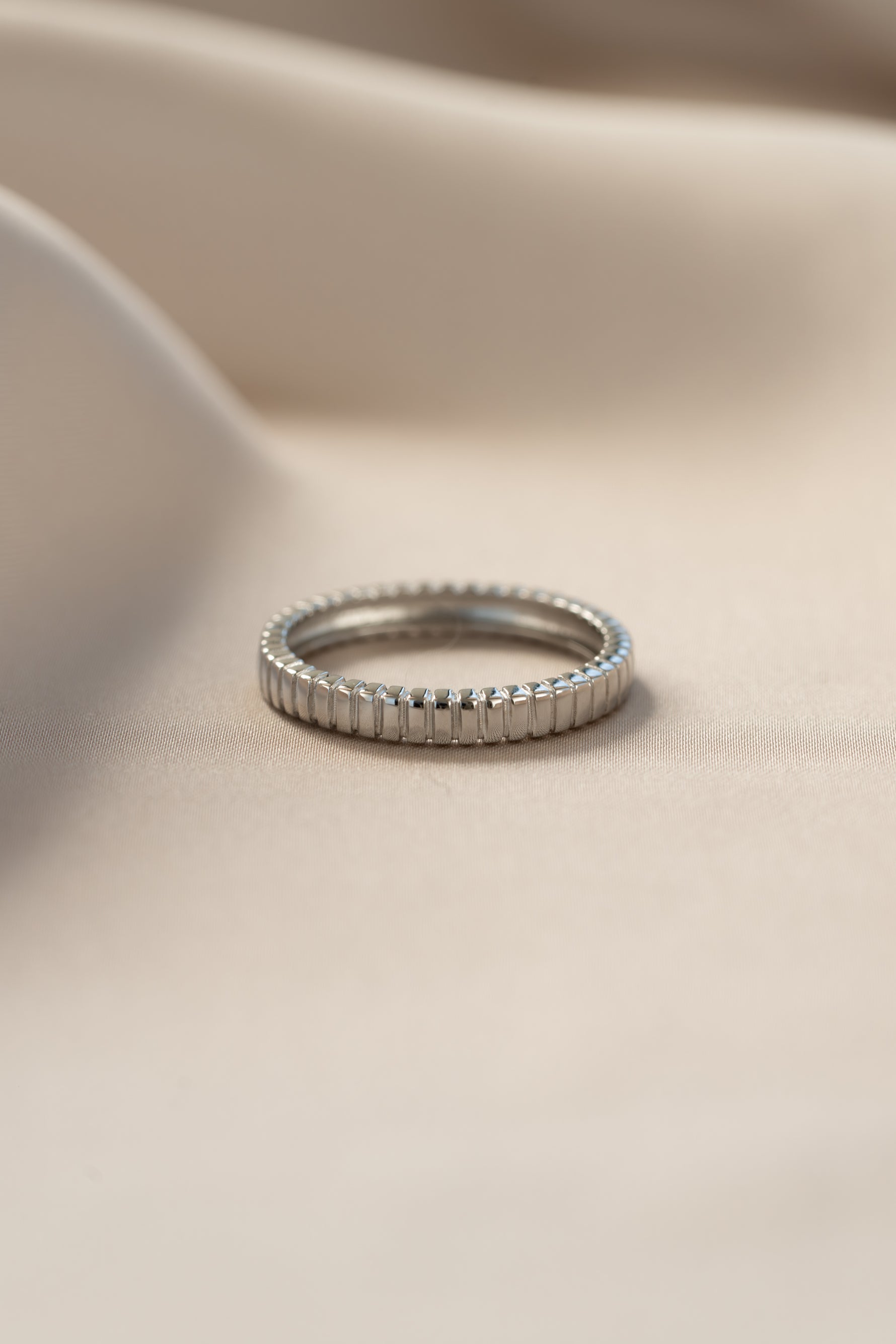Sterling silver Dainty Fluted Ring by Sami Jewels, showcasing a delicate fluted design on a slim band.