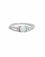 Dainty silver opal ring from Samijewels-527 featuring a smooth white opal gemstone on a simple band.