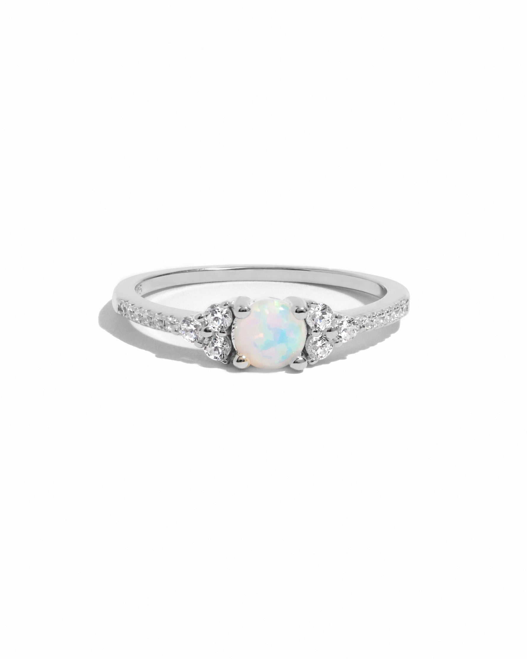 Dainty silver opal ring from Samijewels-527 featuring a smooth white opal gemstone on a simple band.