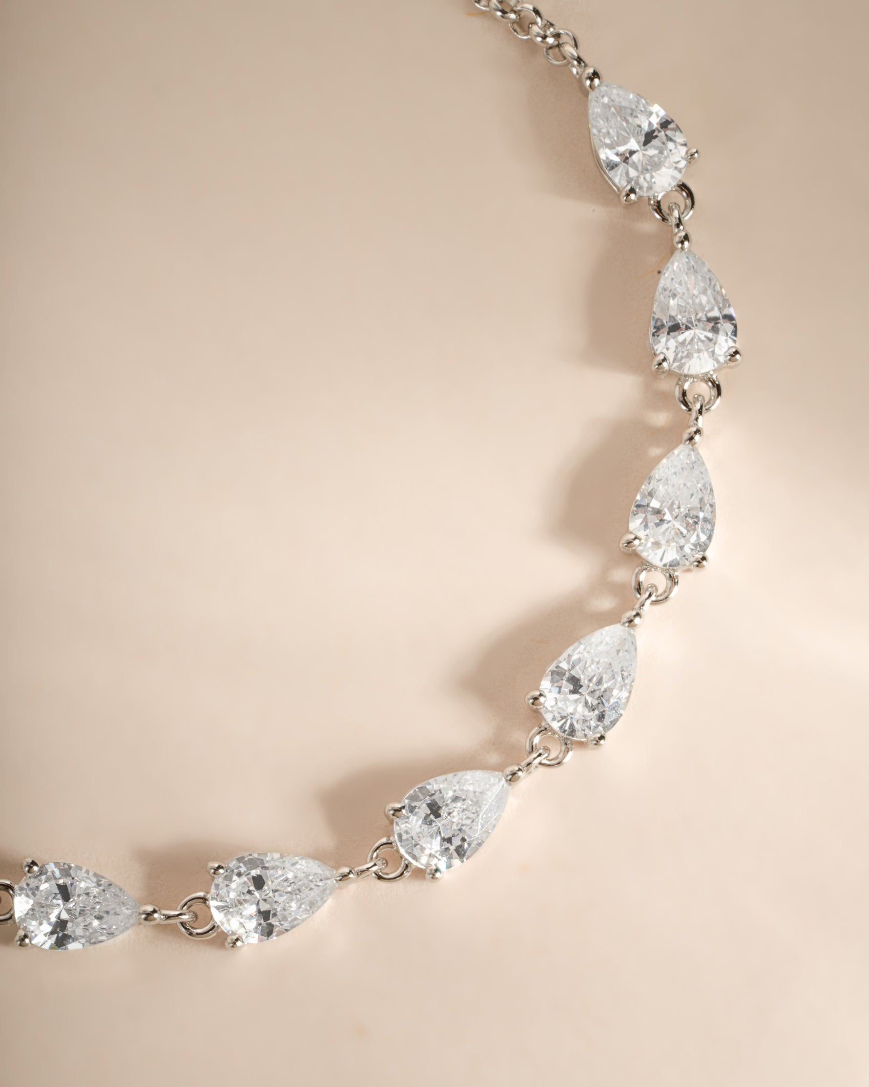 silver pear cut tennis bracelet