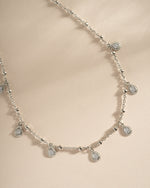 Sterling silver dangling tear drop necklace by Sami Jewels featuring a close-up of the elegant pendant.