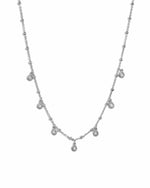 Sterling silver dangling teardrop necklace from Sami Jewels, featuring a elegant teardrop pendant on a delicate chain.