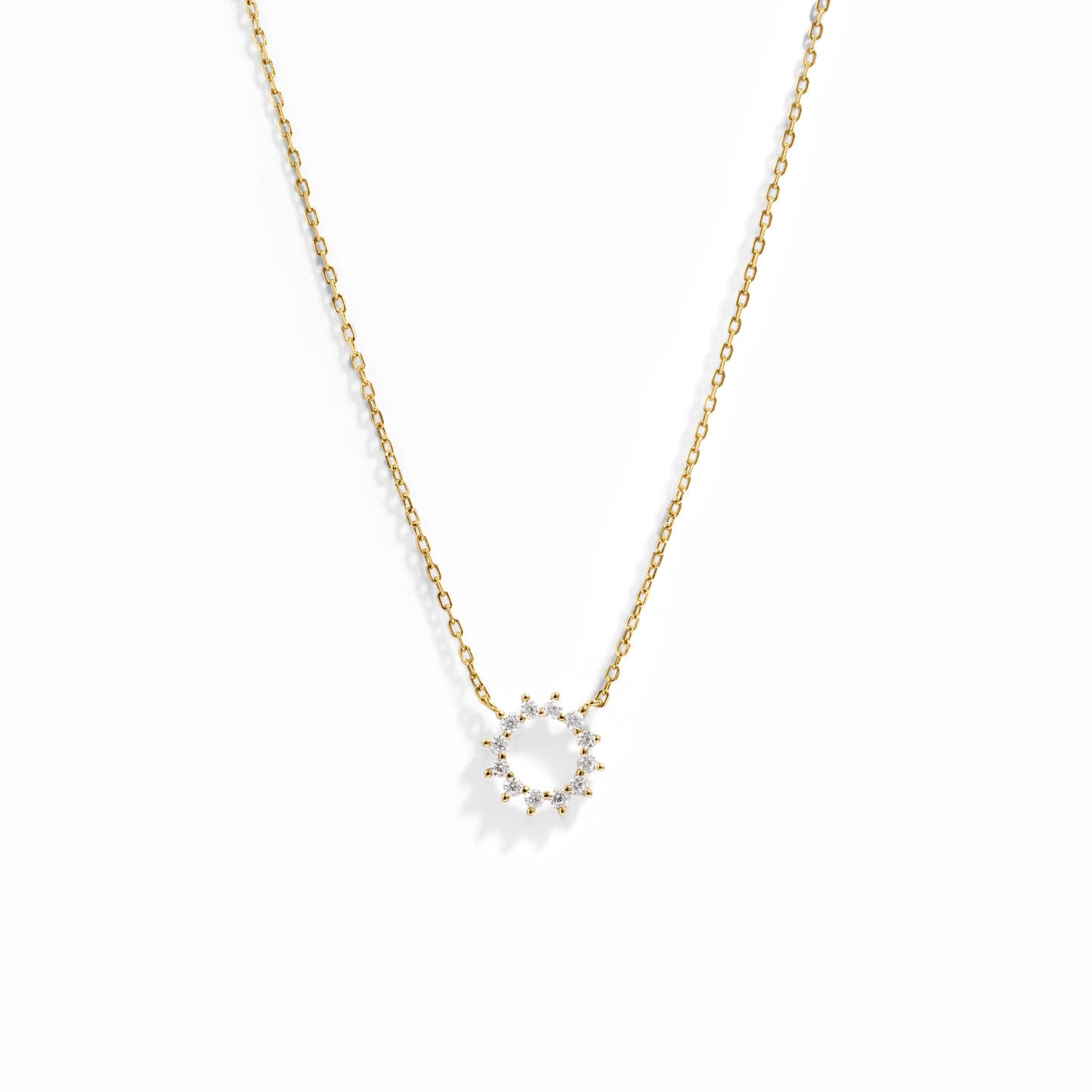 Dainty sunburst necklace on delicate chain in gold plating