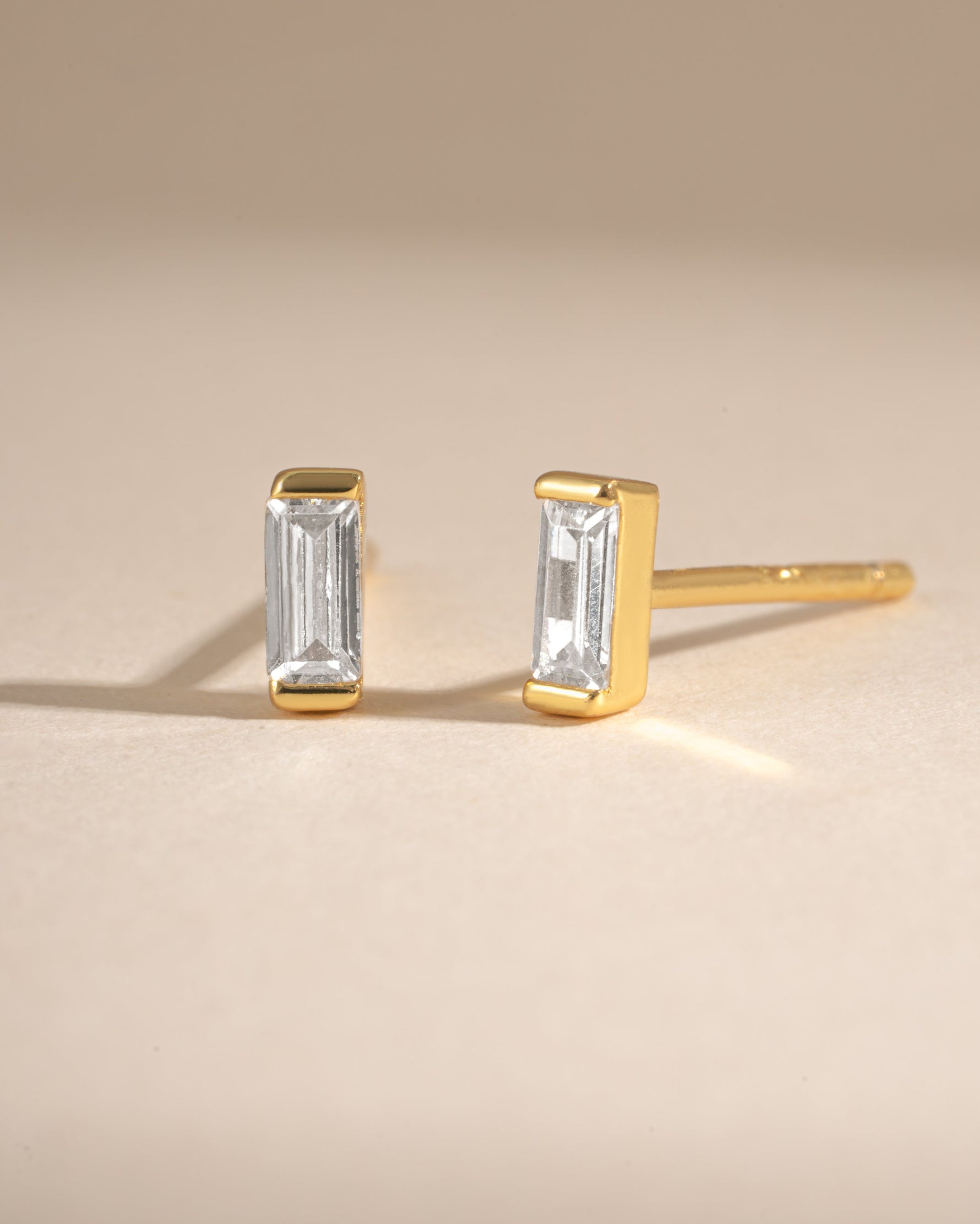 White CZ Baguette Stud Earrings by Sami Jewels featuring sparkling cubic zirconia baguette stones in a classic stud design