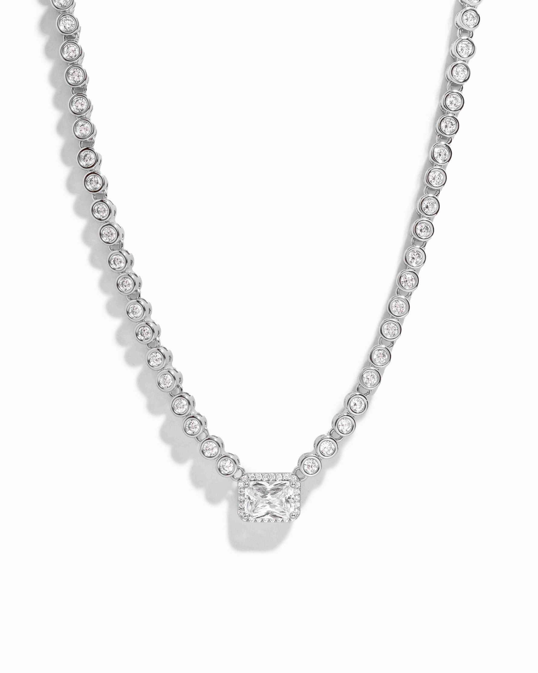 Silver diamond baguette tennis necklace by Sami Jewels featuring sparkling rectangular-cut diamonds on a sleek chain.