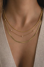 gold beaded pave necklace stack on womens neck