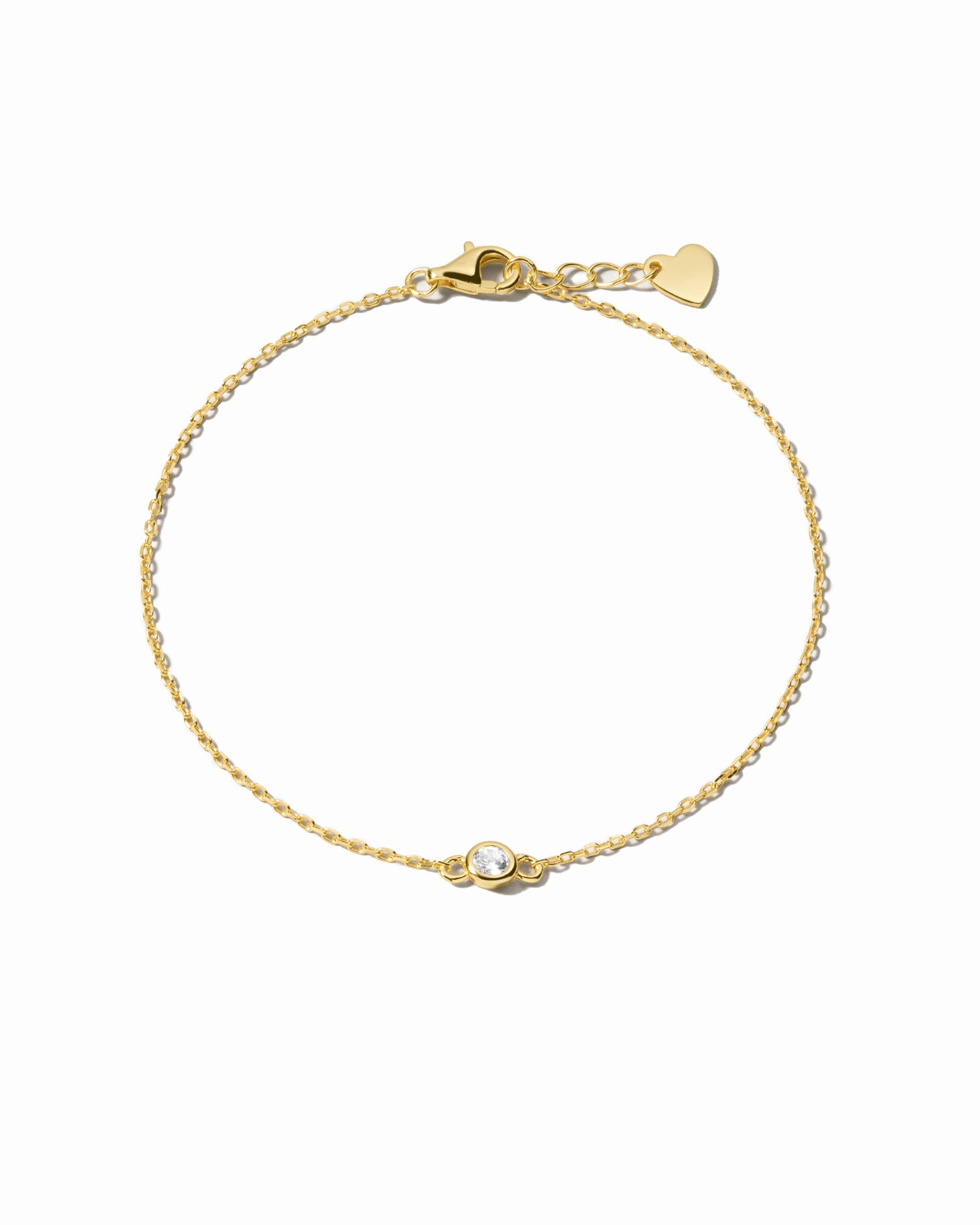 Gold diamond bezel bracelet from Sami Jewels featuring a row of sparkling diamonds on a sleek bracelet design.