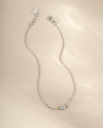 Sterling silver diamond bezel bracelet by Sami Jewels featuring a row of sparkling diamonds on a sleek bracelet.