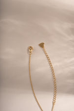 Gold Tiny Bezel Necklace by Sami Jewels featuring a delicate diamond bezel pendant with lobster clasp closure.