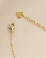 Gold butterfly necklace with diamond accents and lobster clasp by Sami Jewels, featuring a delicate and elegant design.