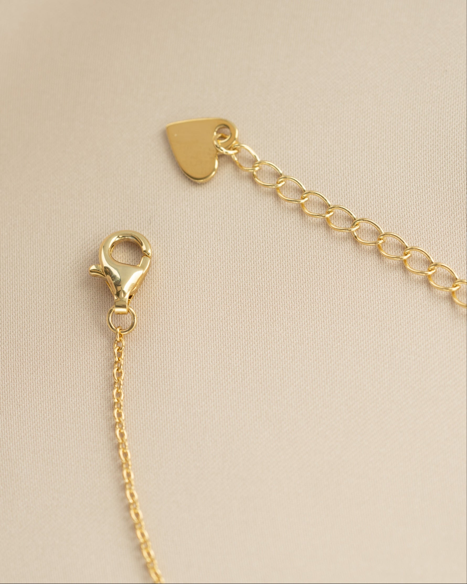 Gold butterfly necklace with diamond accents and lobster clasp by Sami Jewels, featuring a delicate and elegant design.