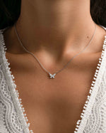 Sterling silver butterfly necklace with diamond accents by Sami Jewels, featuring a delicate butterfly pendant on a fine chain.