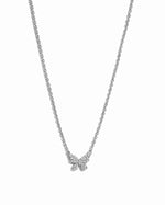 Sterling silver butterfly necklace by Sami Jewels featuring diamond accents, displayed against a white background.