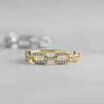 Up close gold pave chain link ring.