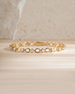 Gold Lilly Tennis Bracelet by Sami Jewels featuring a diamond chain design, viewed from the front.