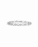 Silver Lilly Tennis Bracelet by Sami Jewels featuring a diamond-chain design on a white background.