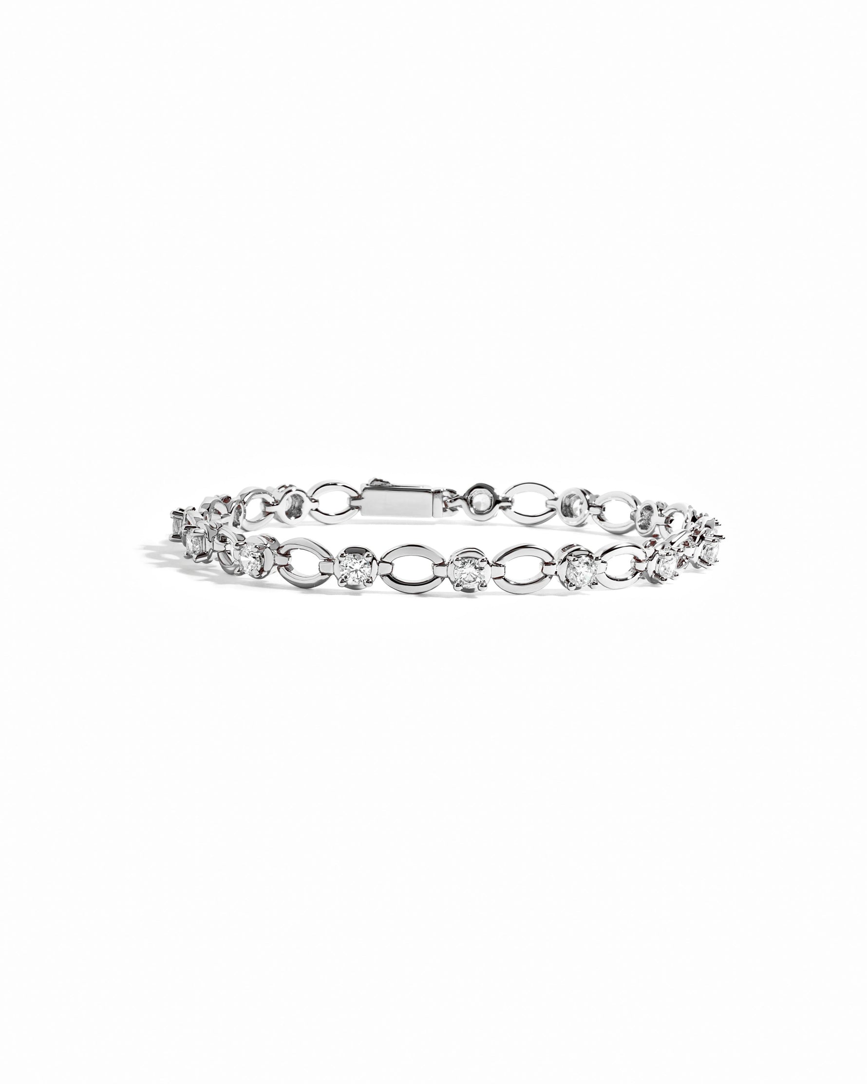 Silver Lilly Tennis Bracelet by Sami Jewels featuring a diamond-chain design on a white background.
