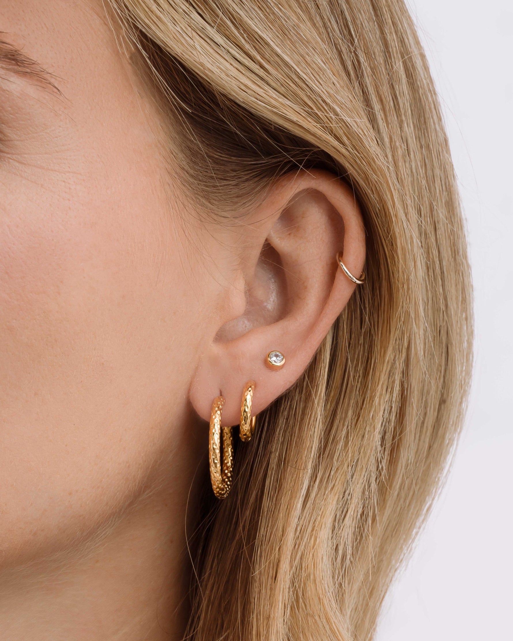 Gold stainless steel SS textured hoop earrings with diamond-cut design, stacked style, waterproof, by Sami Jewels.
