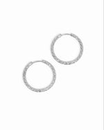 Silver stainless steel SS textured hoop earrings with diamond cut design from Sami Jewels.