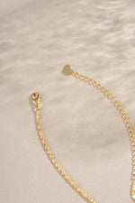 Gold diamond cut rope chain necklace with lobster clasp closure, crafted by Sami Jewels.