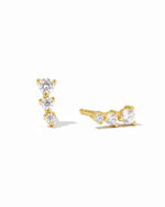 Gold diamond ear climber earrings by Sami Jewels displayed on a white background.