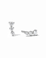 Sterling silver CZ ear climber earrings by Sami Jewels with sparkling diamond-like accents on a white background.