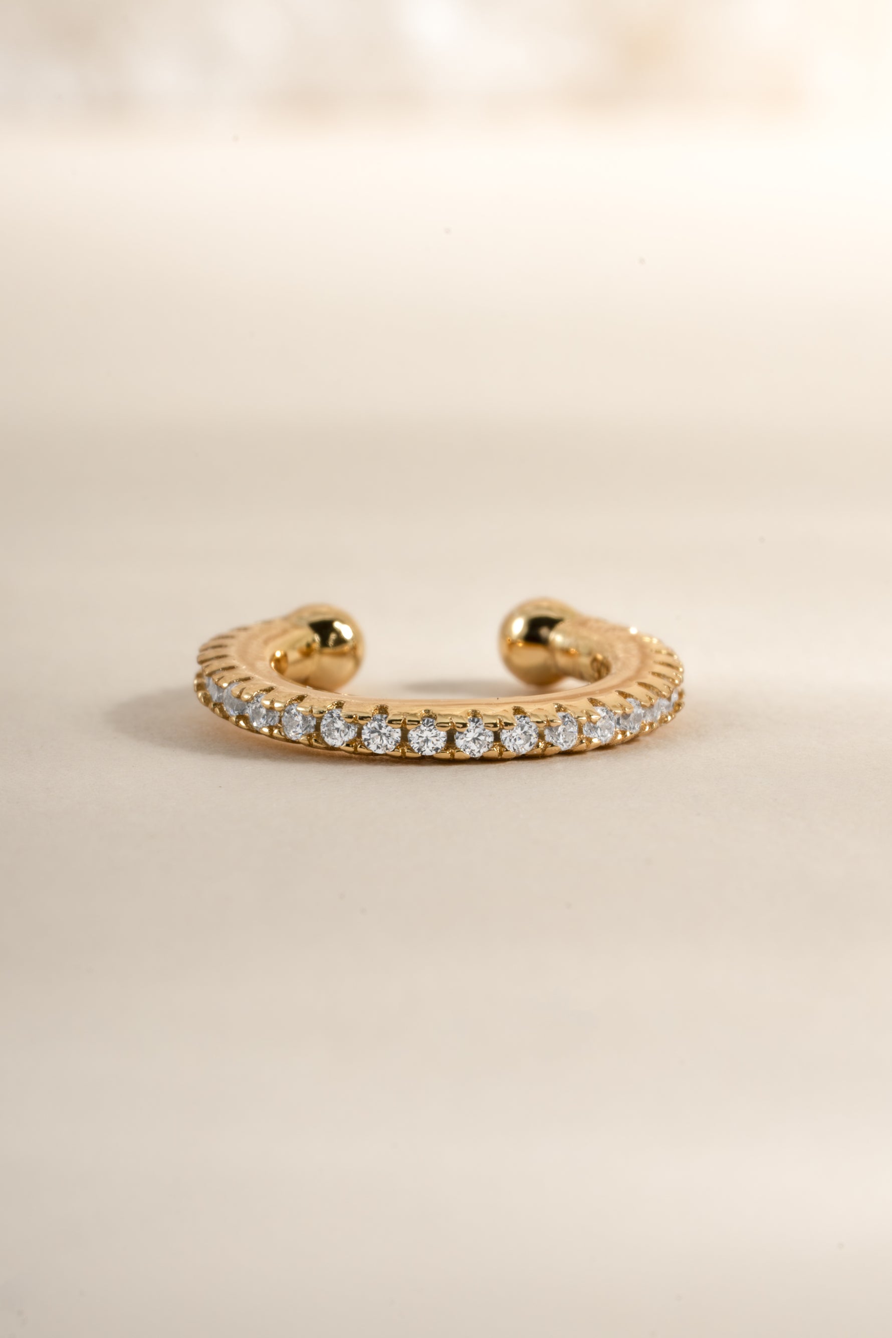 Front view of Samijewels-527 diamond ear cuff earrings showcasing sparkling diamonds and sleek design.