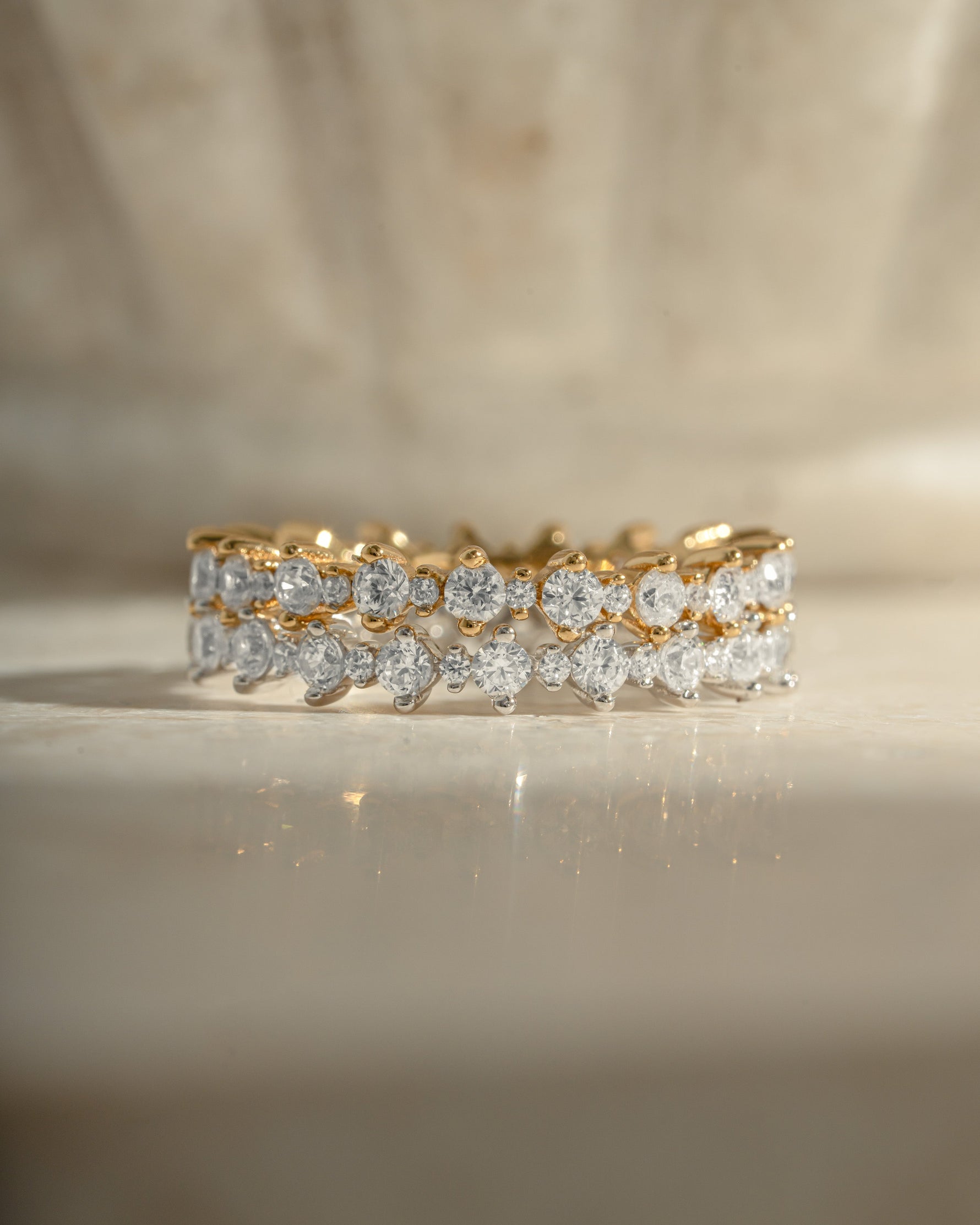 Sami Jewels Rebecca Eternity Ring with diamond accents in gold and sterling silver, stacked design, close-up of the ring band.