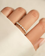 Gold Rebecca Eternity Ring by Sami Jewels featuring a full circle band with sparkling diamonds.