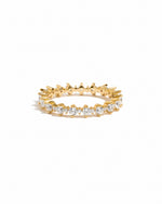 Sami Jewels Rebecca Eternity Ring with sparkling diamonds set in gold, showcasing a continuous circle of brilliance.