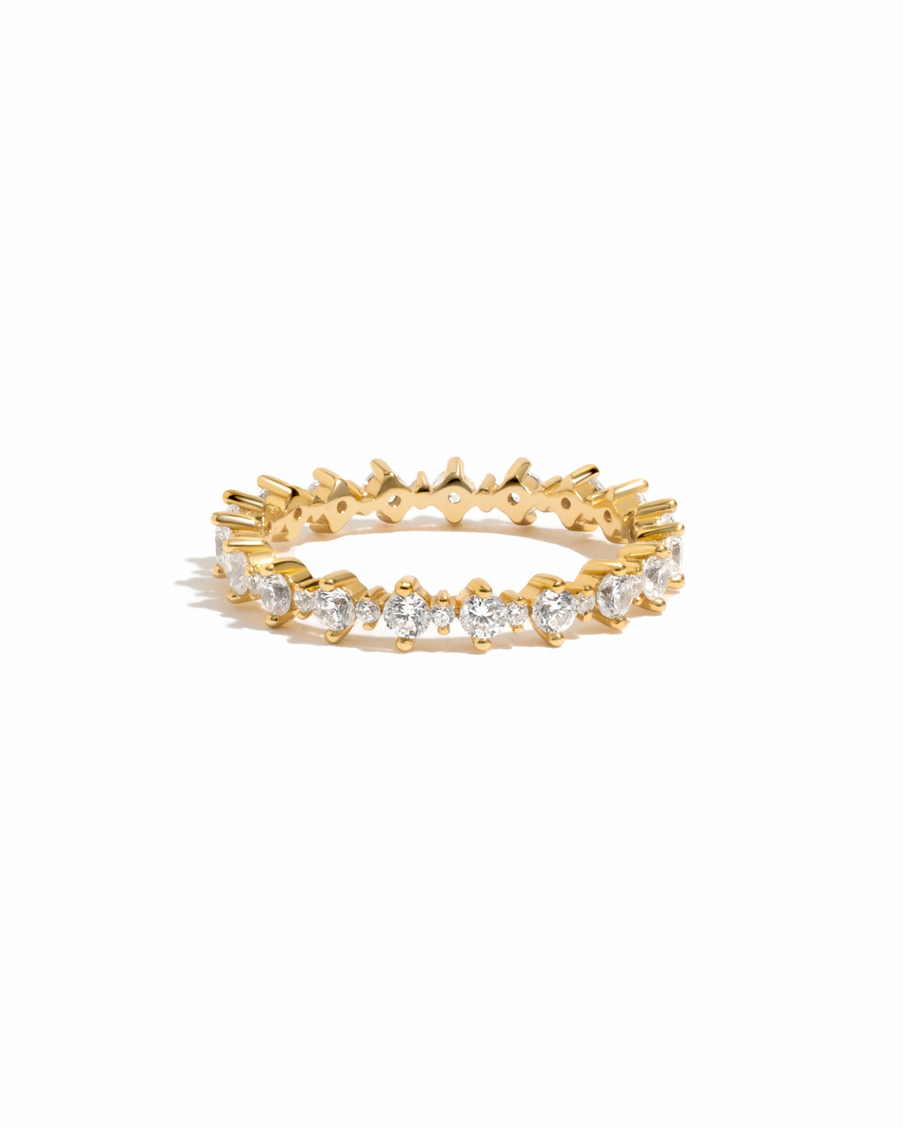 Sami Jewels Rebecca Eternity Ring with sparkling diamonds set in gold, showcasing a continuous circle of brilliance.