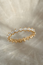 Sami Jewels Rebecca Eternity Ring with a full circle of sparkling diamonds on a gold band, elegant and timeless jewelry piece