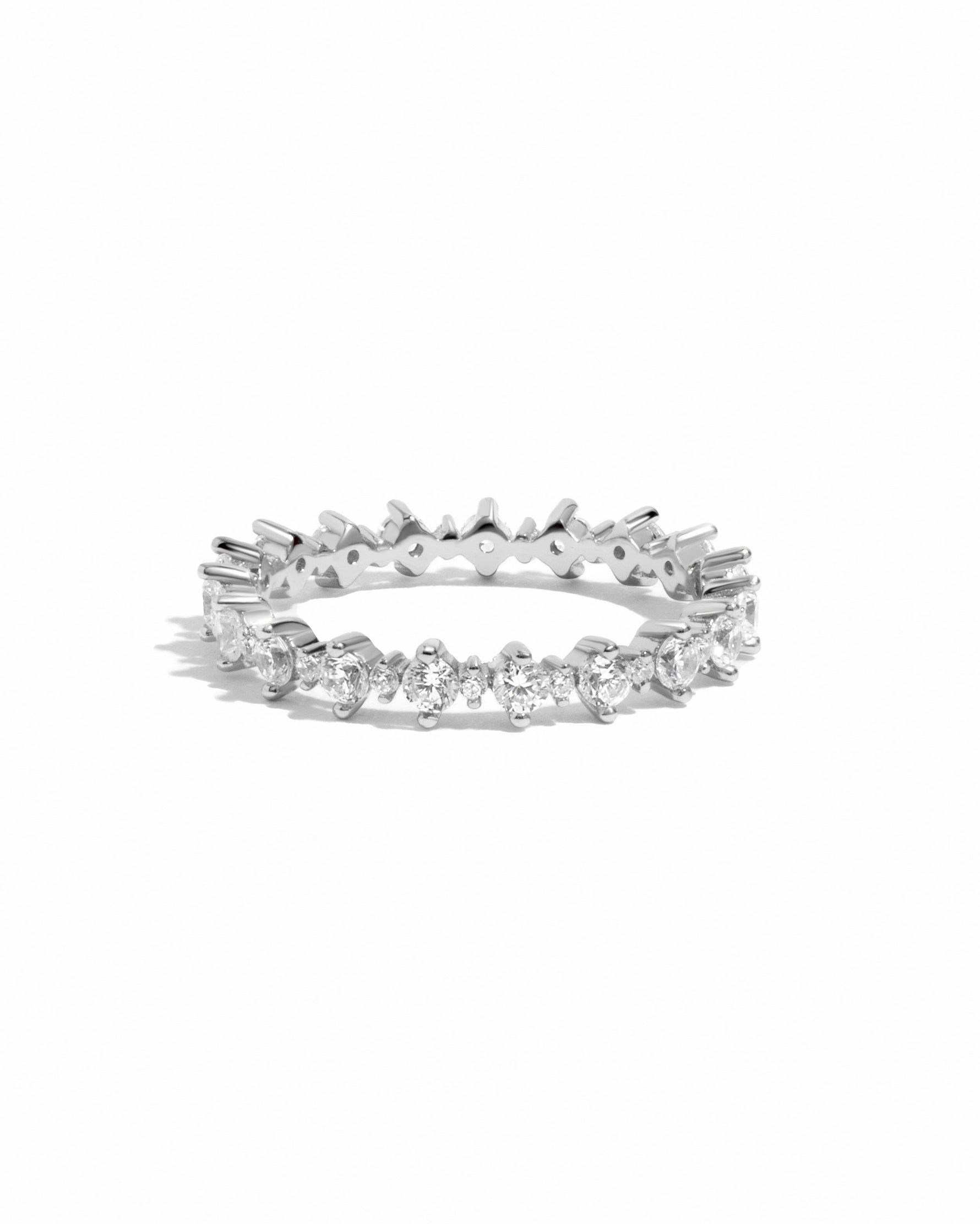 Sami Jewels Rebecca Eternity Ring with sparkling diamonds in sterling silver band, displayed on a white background.