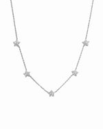 Sterling silver Diamond Flower Necklace with intricate floral charm, designed by SJ Faire, displayed against a white background.