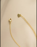 diamond flower necklace in gold closeup of lobster clasp closure style